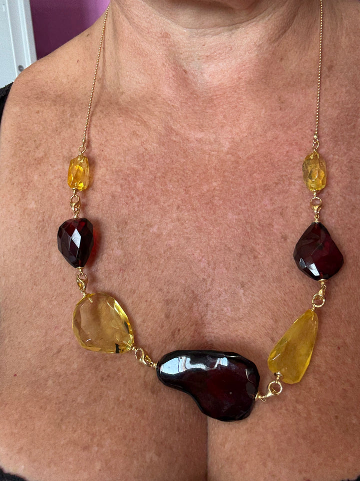 Collana sassi di ambra multicolore  montata in argento dorato