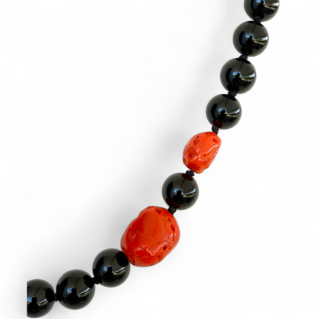 Onyx and coral necklaces mounted in gold-plated silver