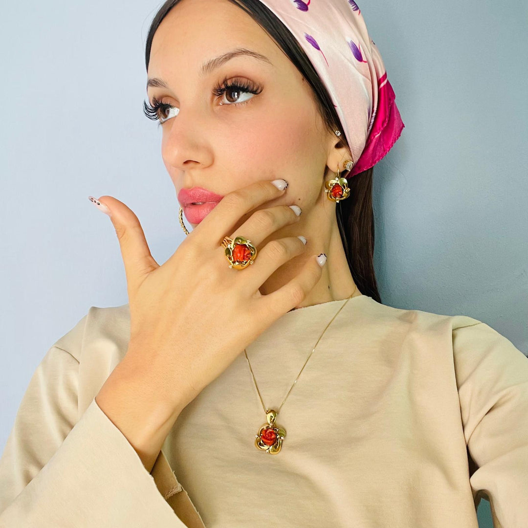 Pink coral pendant necklace set in gold-plated silver