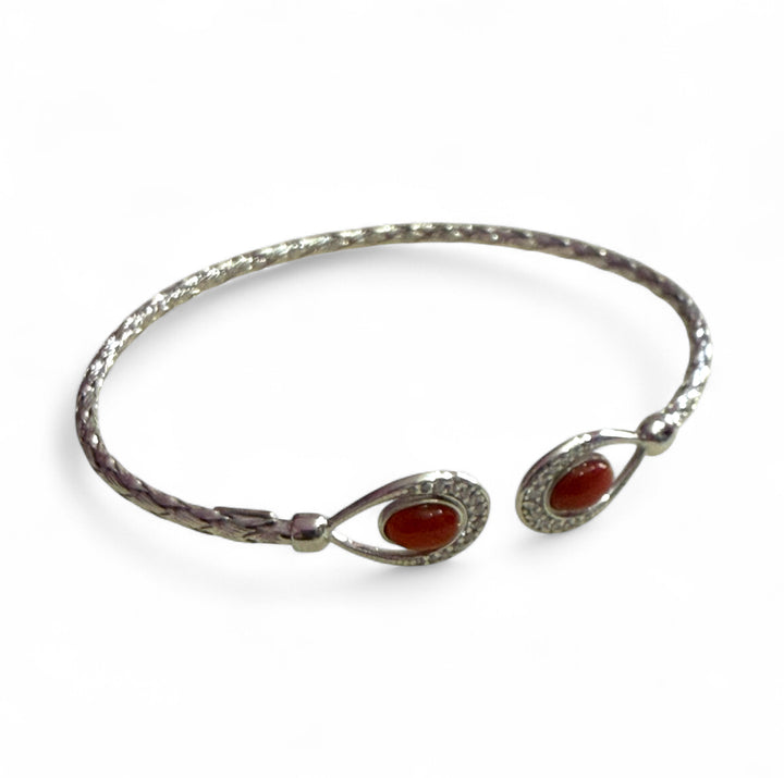 End of collection - comma slave bracelet in coral set in silver