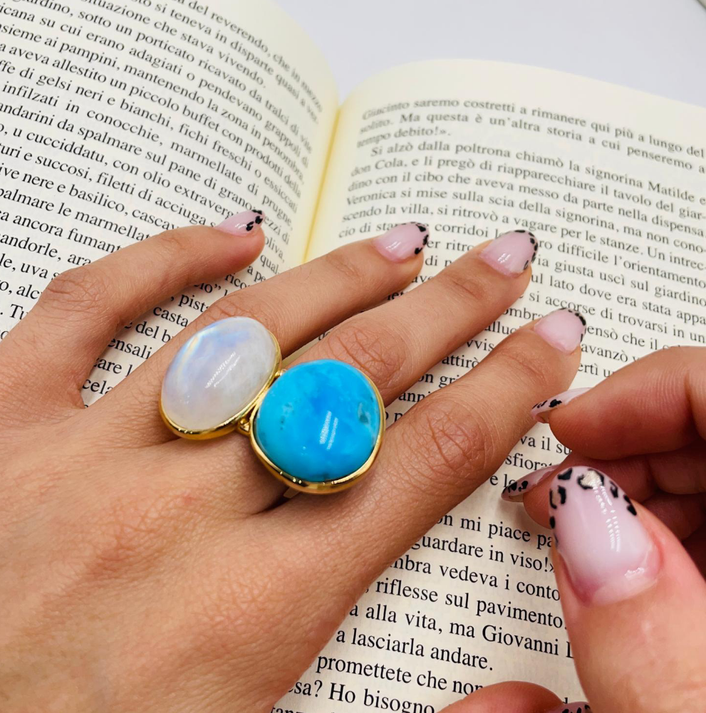 Oval turquoise and opal ring set in silver