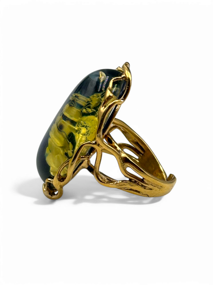 Retro engraved "fairy" ring in blue amber mounted on gold plated silver