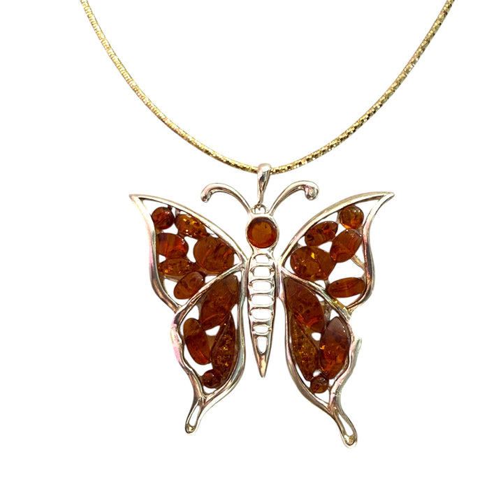 Baltic amber butterfly pendant necklace, set in silver