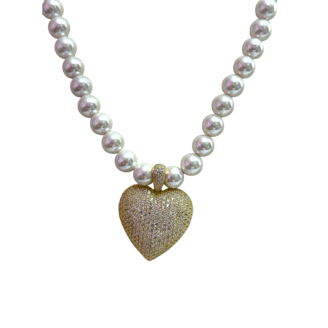 Heart necklace with zirconia and silver mounted on pearls
