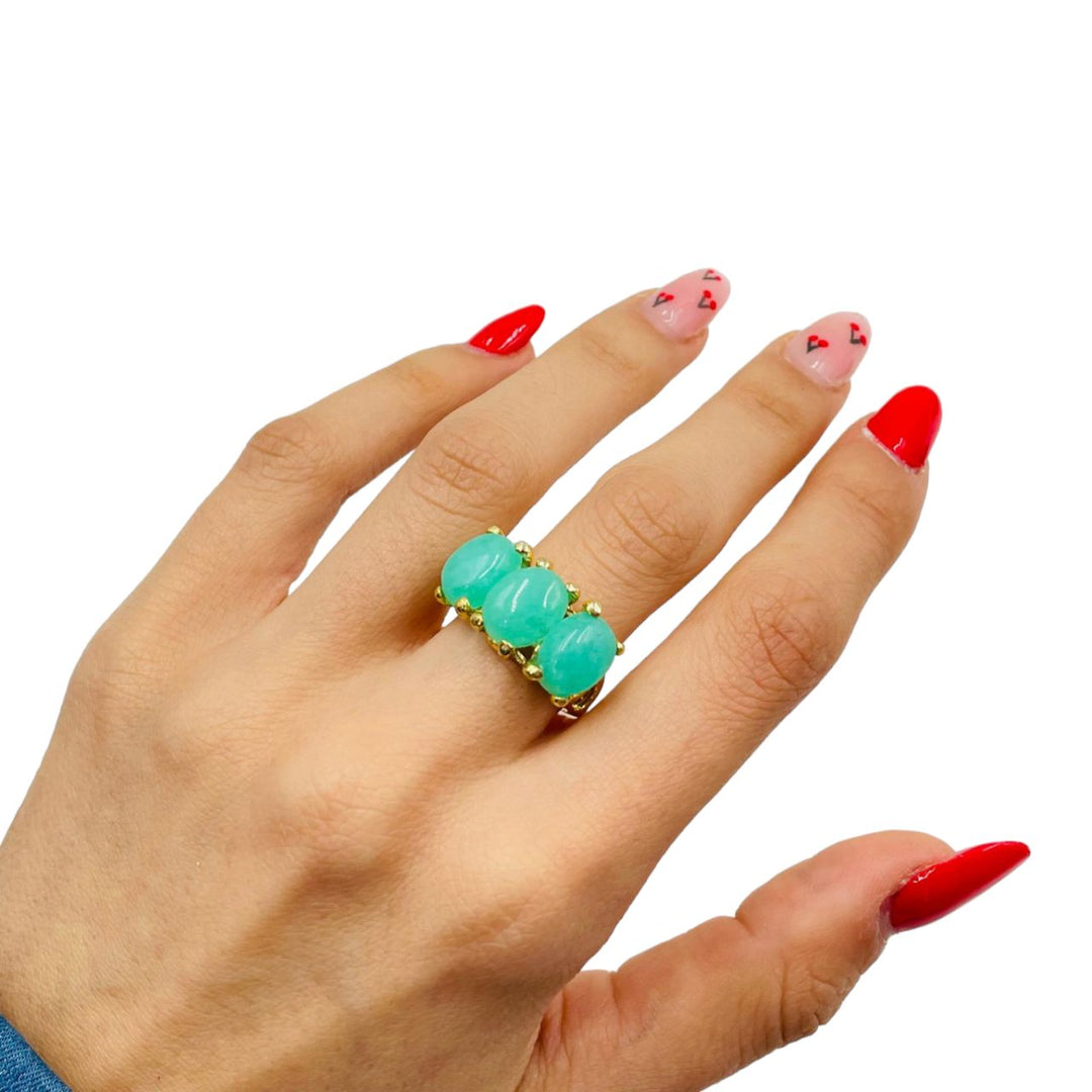 Green quartz trilogy ring, mounted on silver