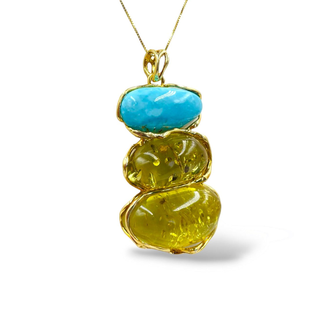 Amber and turquoise tris pendant necklace mounted on silver