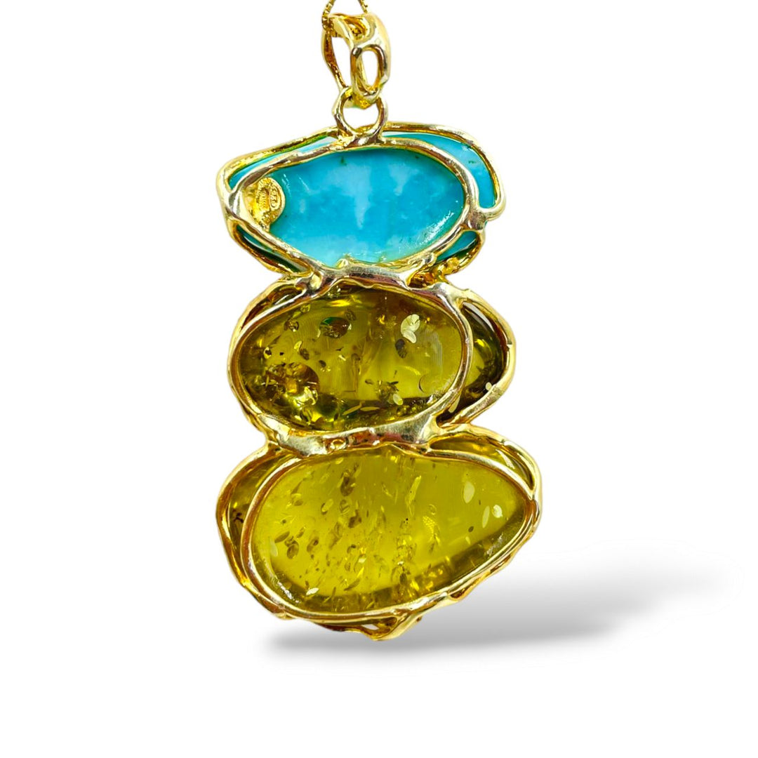 Amber and turquoise tris pendant necklace mounted on silver