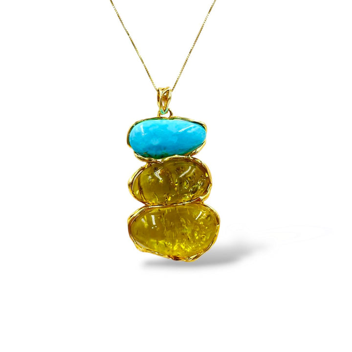 Amber and turquoise tris pendant necklace mounted on silver