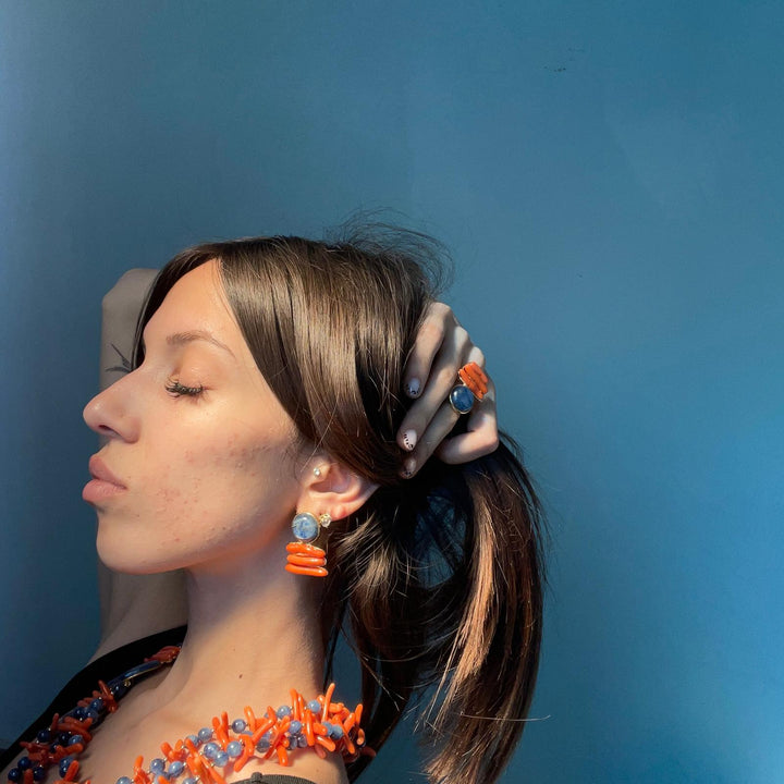 Decomposed earrings in kyanite and coral mounted on silver