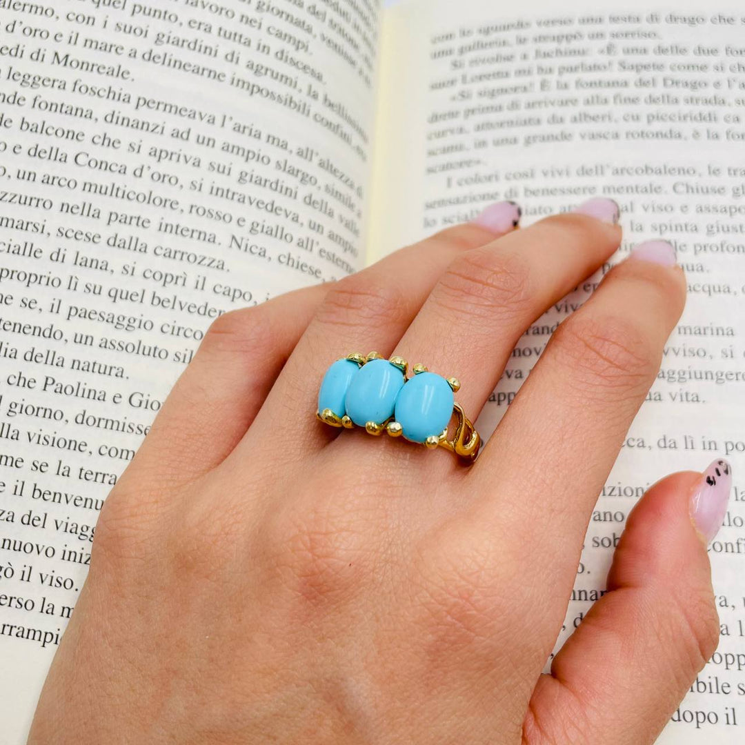 Anello Trilogy in pasta turchese montato su argento