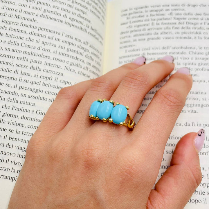 Anello Trilogy in pasta turchese montato su argento