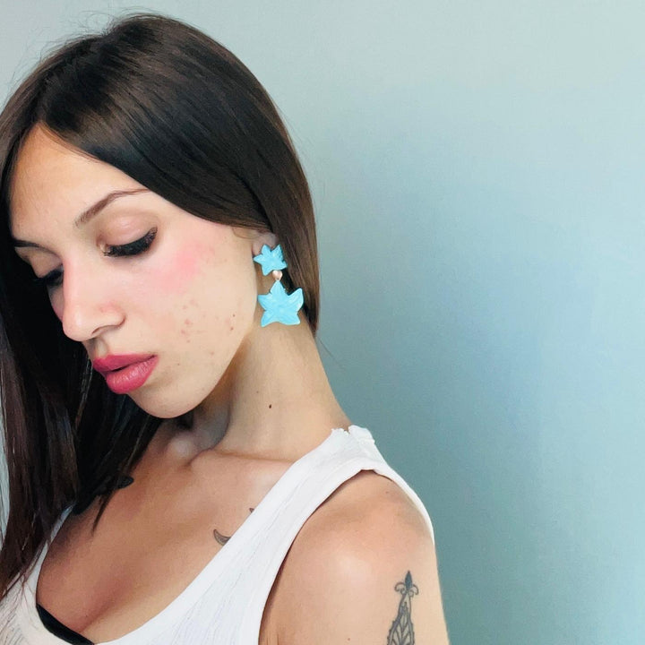 END OF COLLECTION - Turquoise paste star earrings mounted on silver