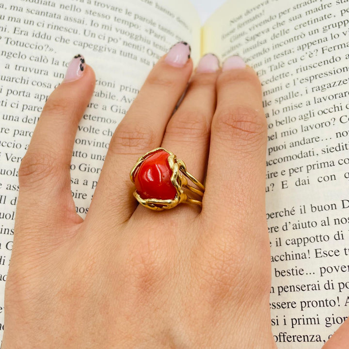 Coral stone ring mounted on silver