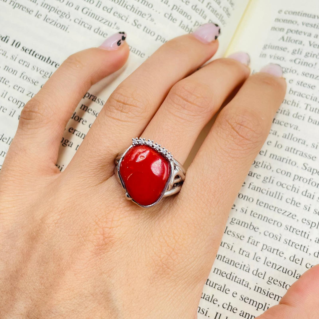 Coral stone ring mounted on silver