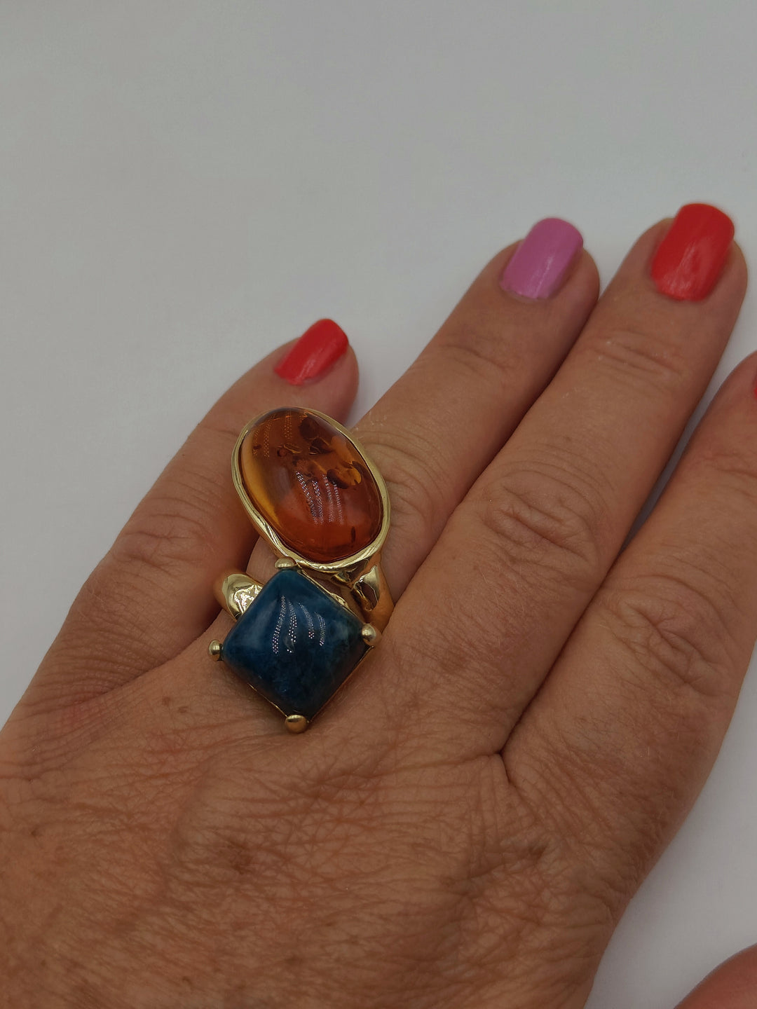 Amber and apatite ring mounted on silver