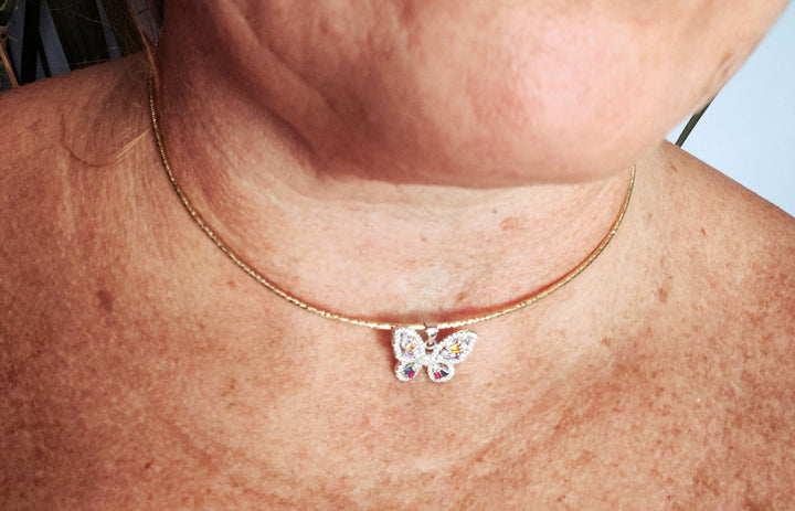 Butterfly pendant in colored zirconia mounted on silver