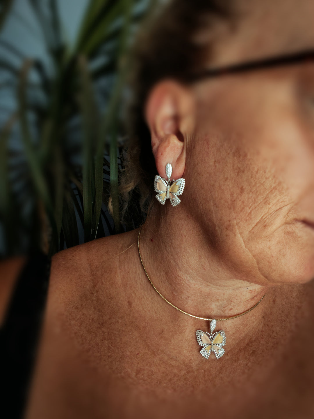 Butterfly earrings in silver, gold and copper with zircons