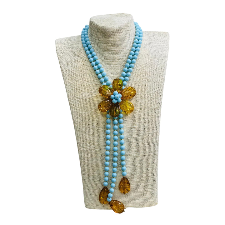 Collana fiore di ambra montata in agata ed in perle di maiorca