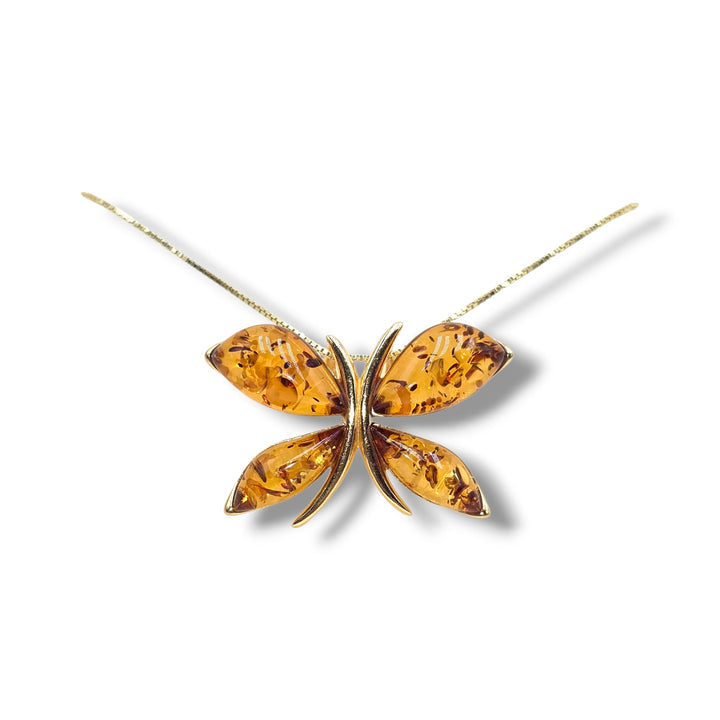 Collana ciondolo farfalla di ambra montata in argento dorato