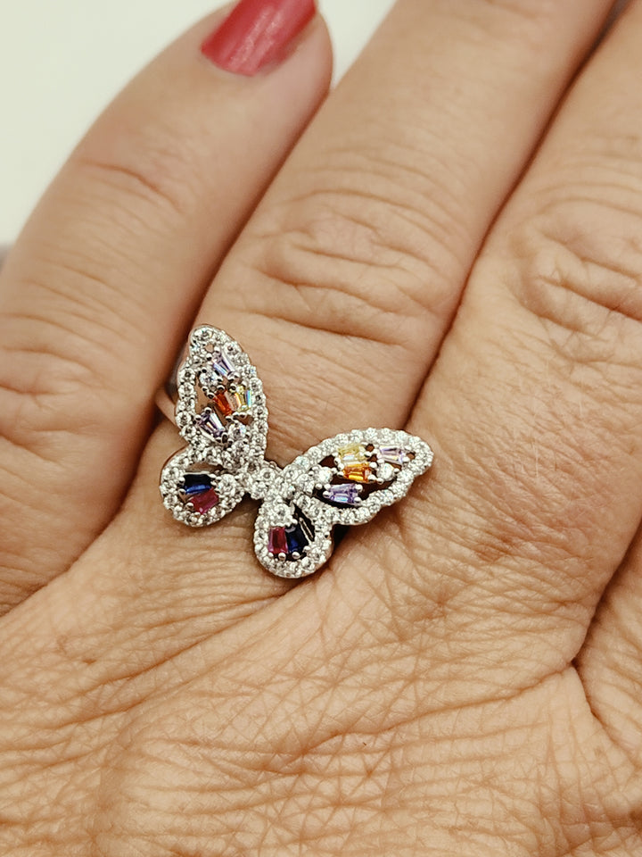 Anello farfalla in zirconi colorati montato su argento
