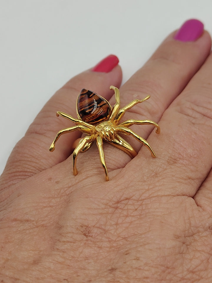 Amber spider ring mounted on gold-plated silver