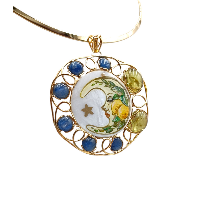 Mother of pearl moon pendant mounted on silver