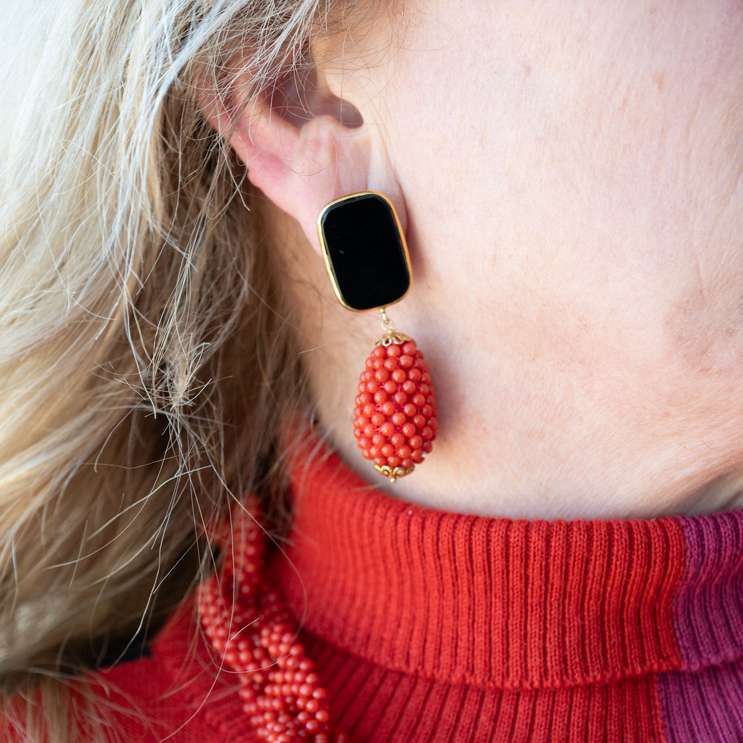 Red coral and black agate pendant earrings mounted on silver