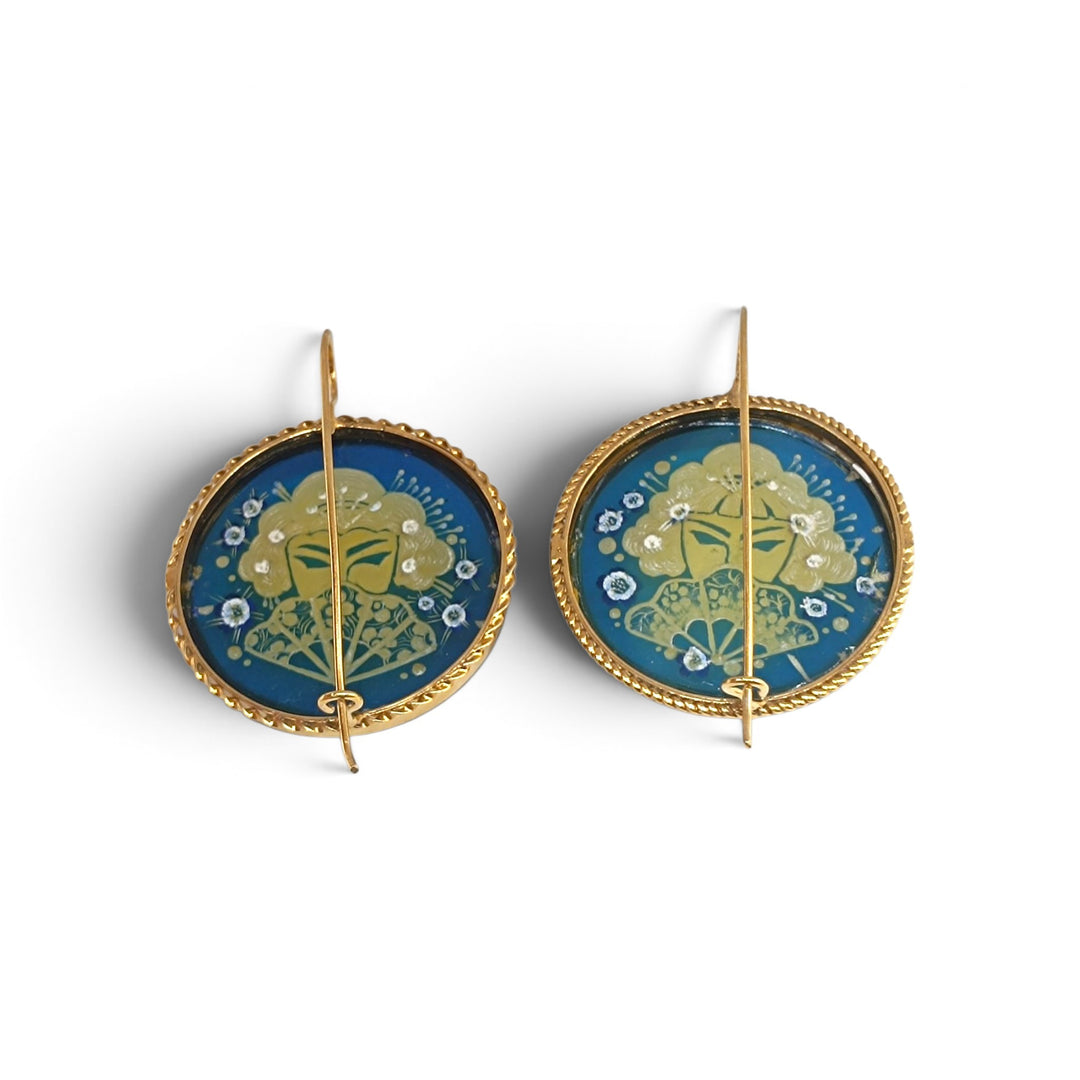 Orecchini Geisha di Ambra blu montati in Argento Dorato