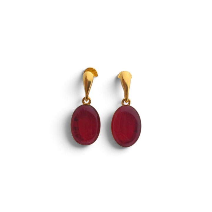 Orecchini Ovali di Ambra rossa montati in Argento Dorato
