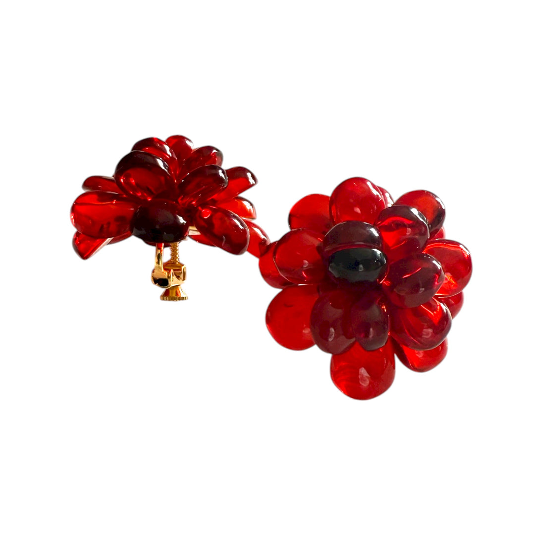 Orecchini “fiori” di ambra rossa del baltico, montati  in argento dorato