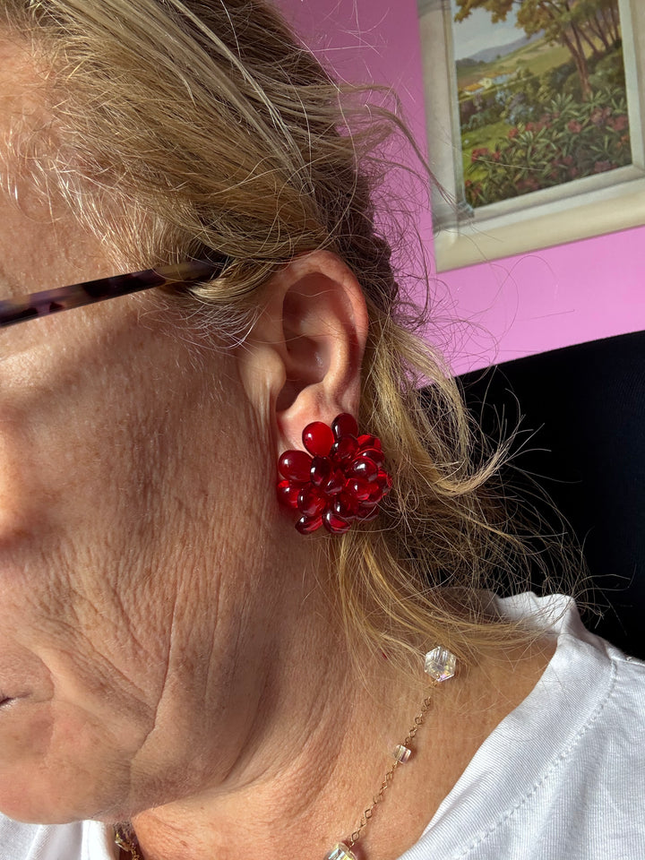 Orecchini “fiori” di ambra rossa del baltico, montati  in argento dorato