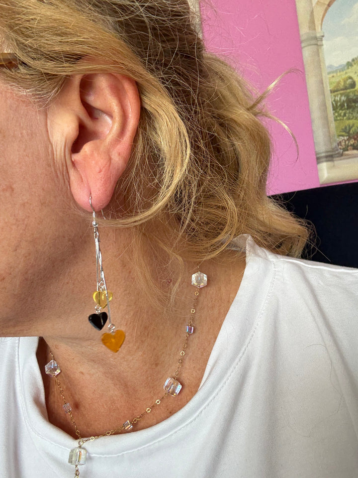 Multicolored amber heart pendant earrings set in silver