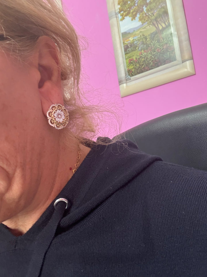 Floral patch earrings set in silver and zirconia