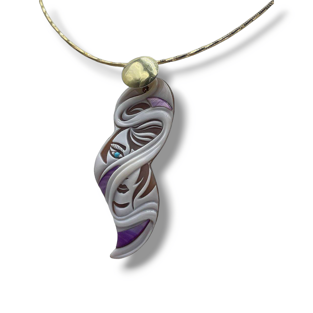 "Enigma collection" pendants in cameo and mother of pearl mounted on silver