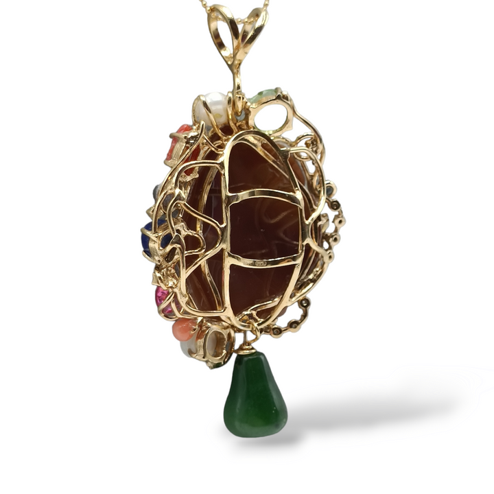 Cameo flower pendant mounted on gold plated silver 