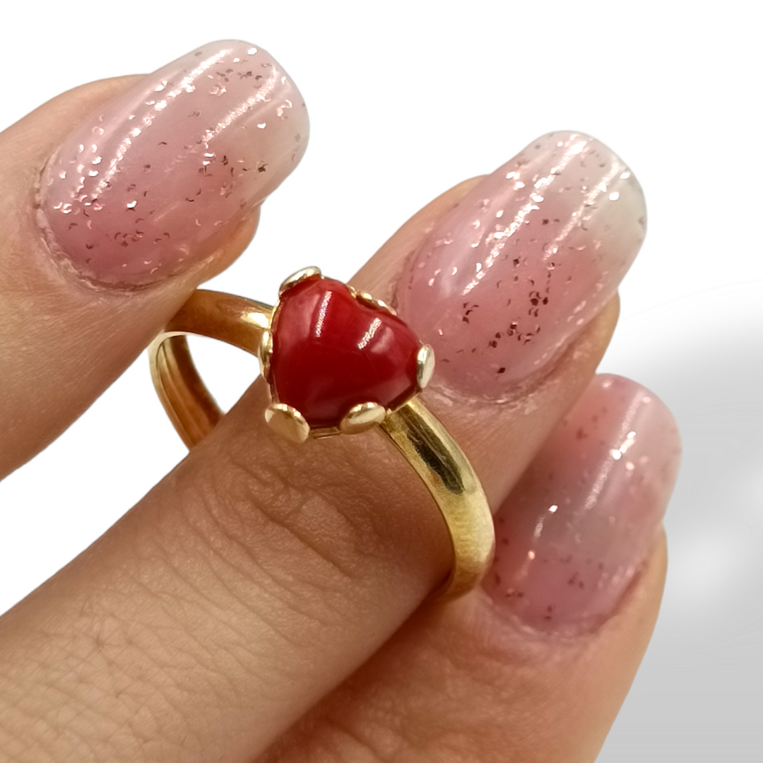 Coral heart ring mounted on silver 