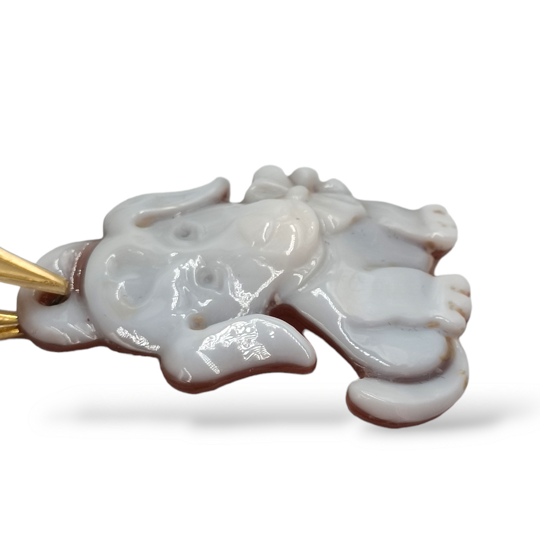 Cameo dog pendant mounted on silver