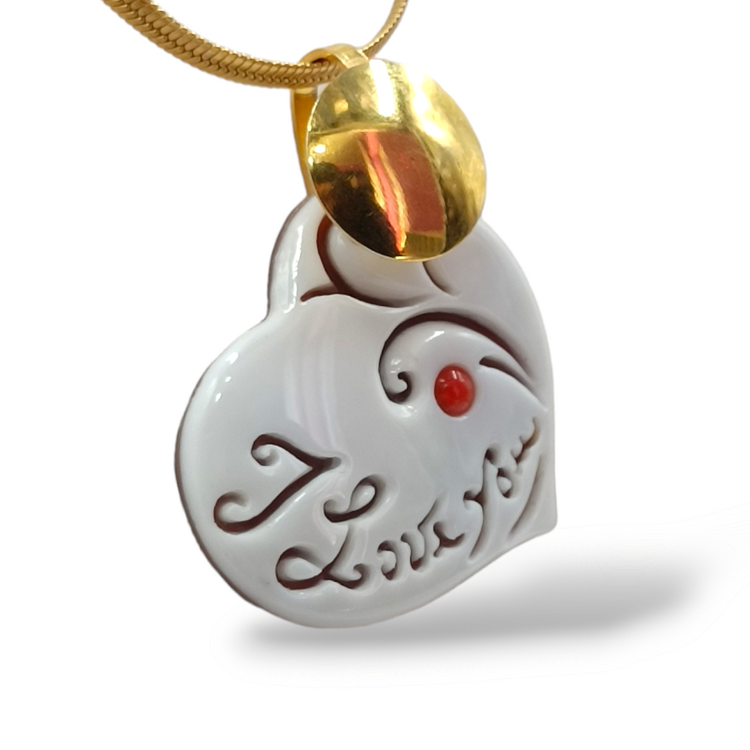 Ciondolo cuore in cammeo montato su argento