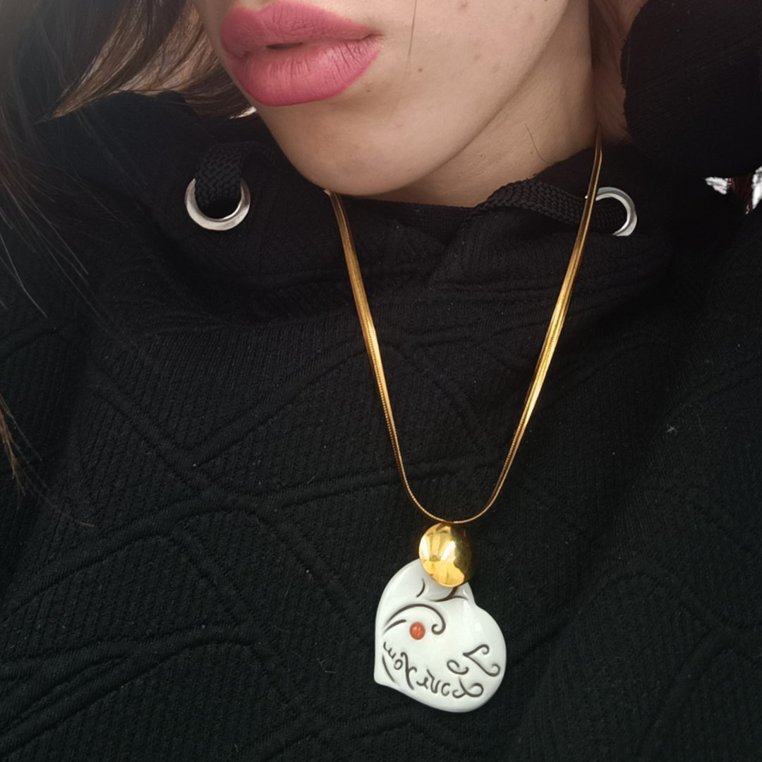 Ciondolo cuore in cammeo montato su argento
