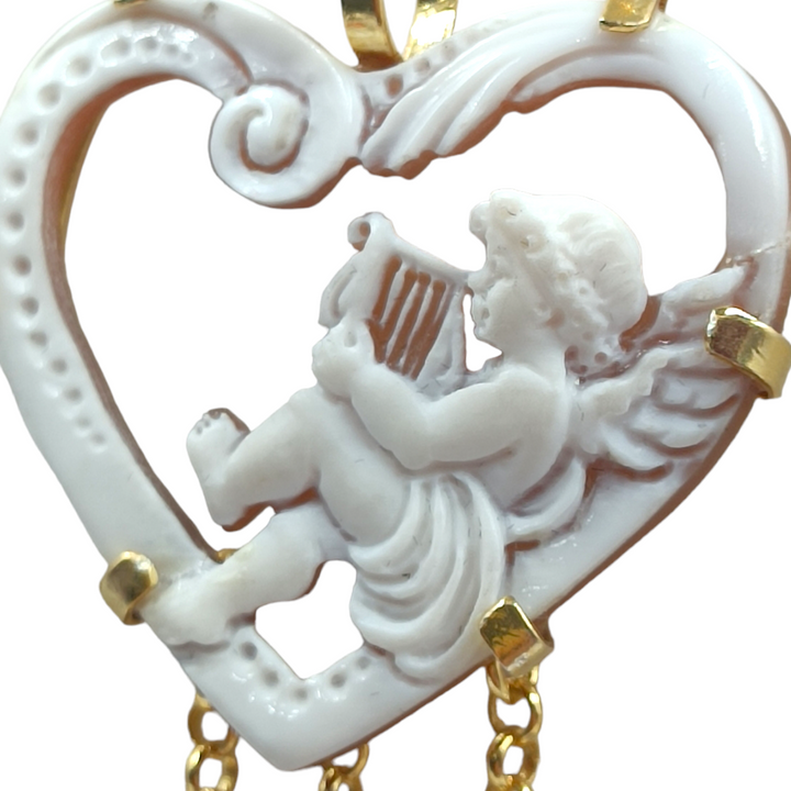 Cupid pendant in cameo mounted on silver