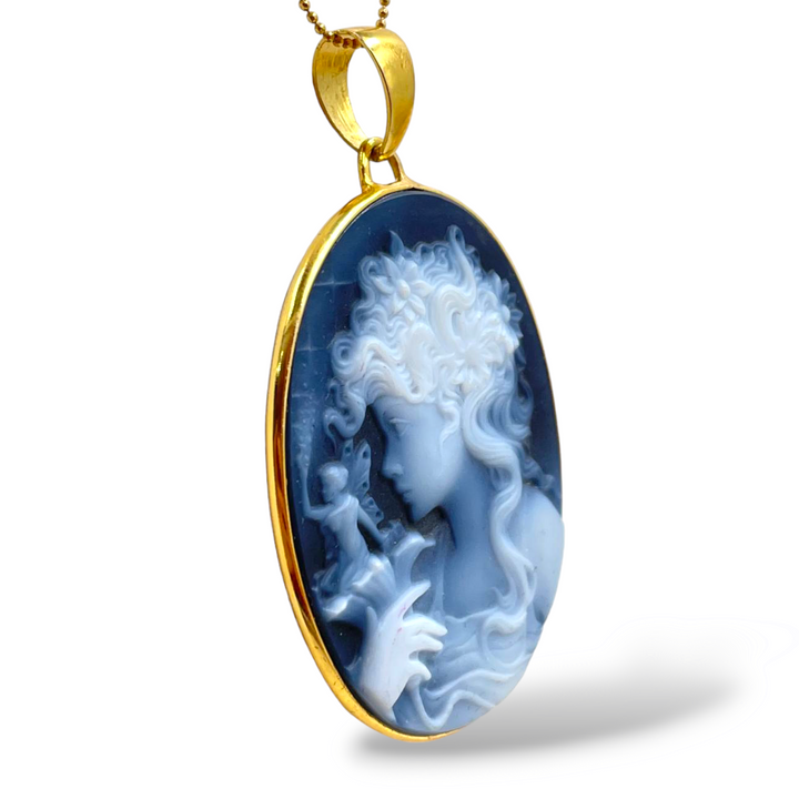 Blue agate fairy pendant mounted on silver