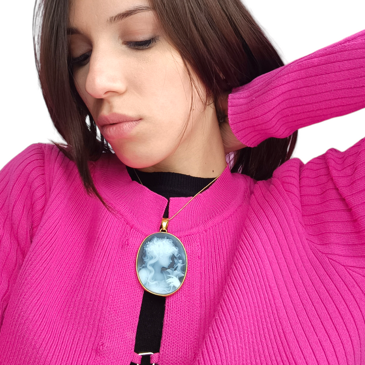 Blue agate fairy pendant mounted on silver