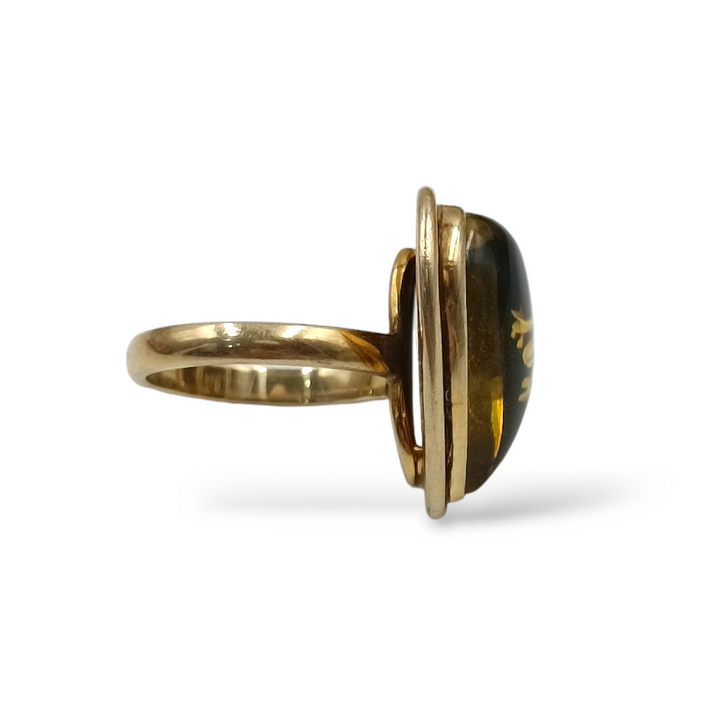 Amber heart ring mounted on silver