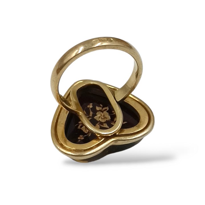 Amber heart ring mounted on silver