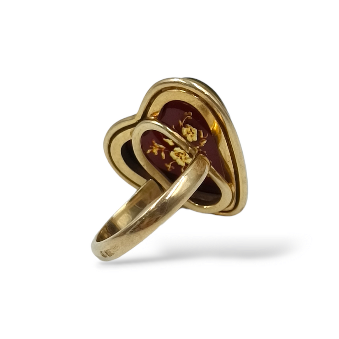 Amber heart ring mounted on silver