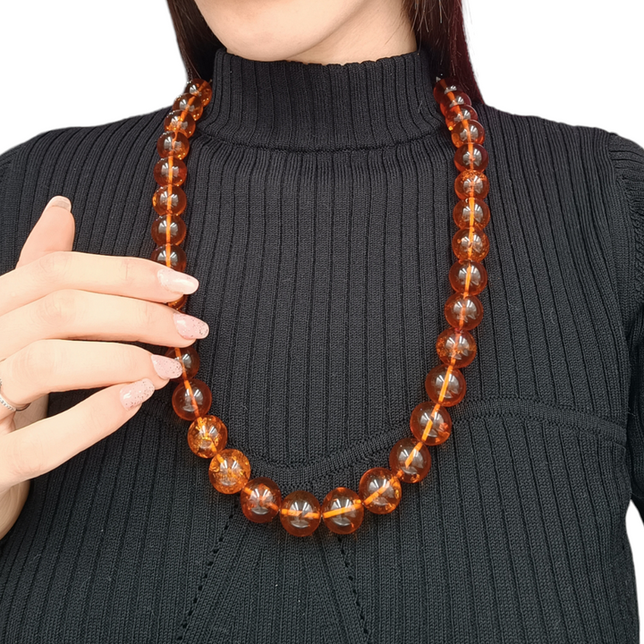 Collana in ambra rossa del baltico montato su argento