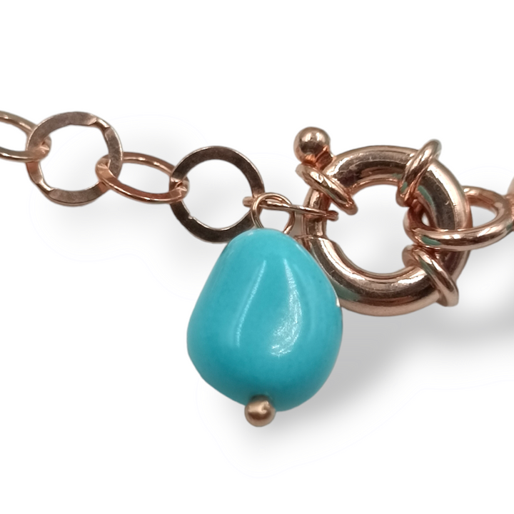 Collana di sassi in pasta di turchese e corallo montato su argento ramato