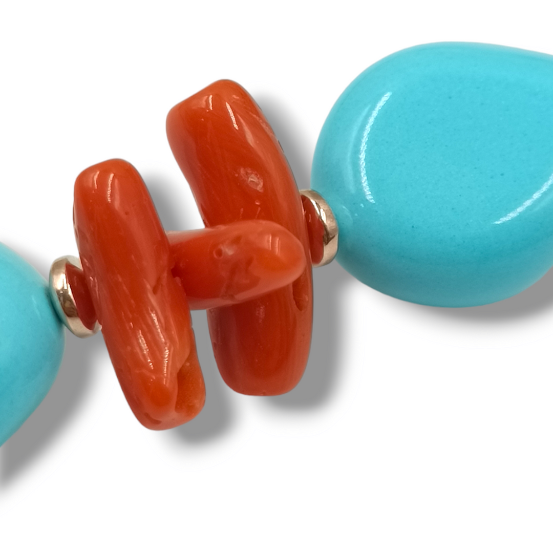 Coral sphere bracelet mounted on turquoise and silver paste