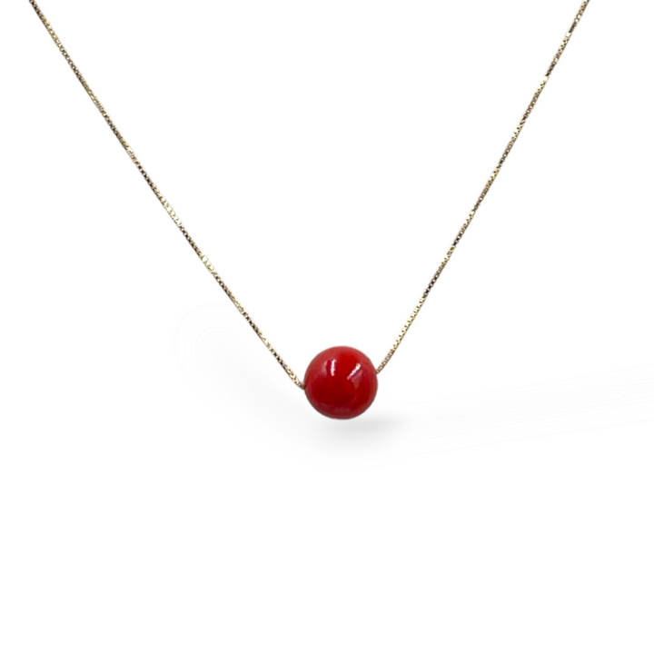 Band ring on red coral