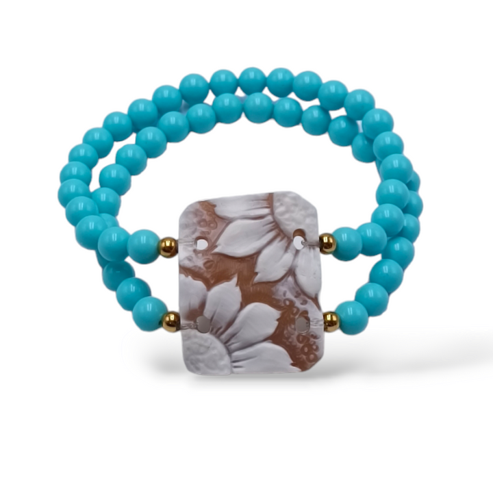 Bracciale fiori in cammeo montati su pasta turchese